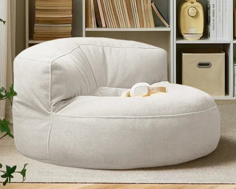Fauteuil de lecture pouf beige