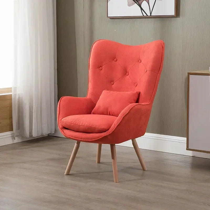 Fauteuil de lecture vintage saumon avec pattes en bois-1