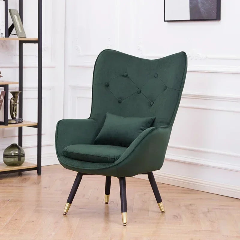 Fauteuil de lecture vintage vert foncé avec pattes noires dorées-1